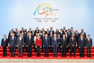 Xi visits New Development Bank