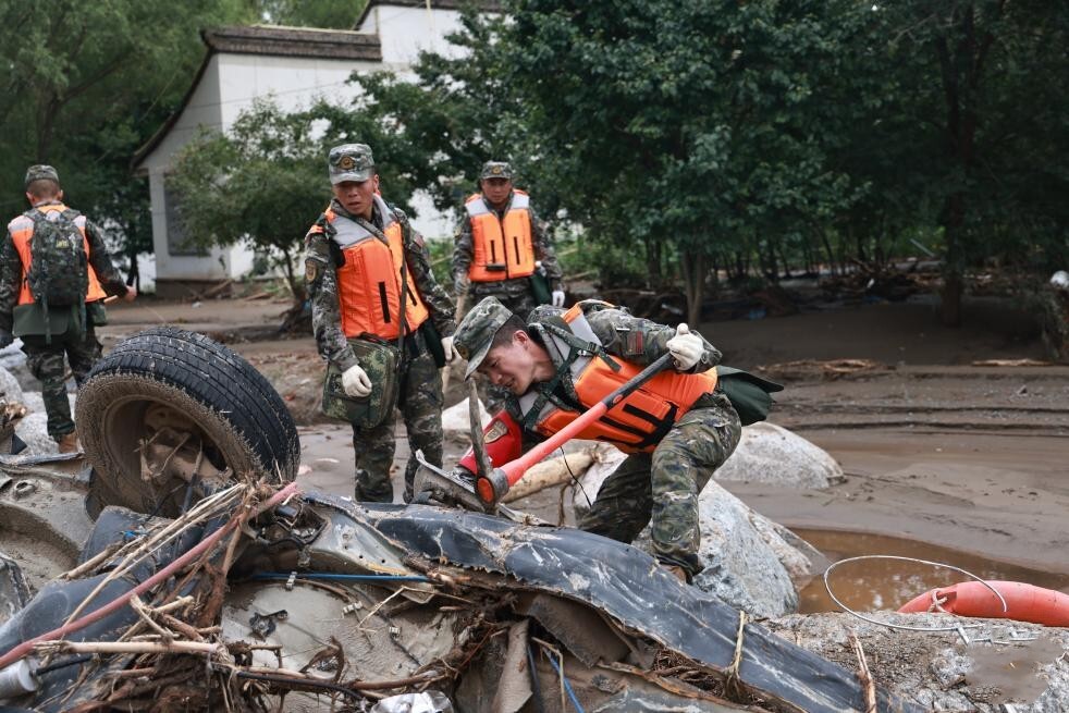 Rescue efforts continue after mountain torrents hit NW China's Gansu