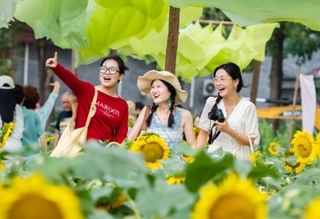 Summer travel in full swing across China
