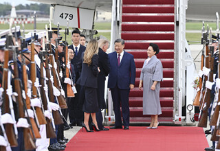 Xi lands in U.S. for state visit, greeted by Trump at airport