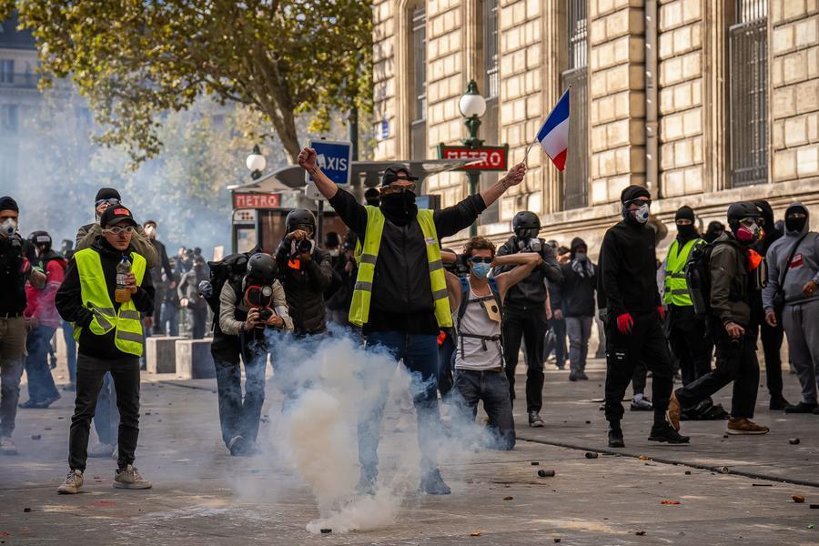Macron vows legal action against perpetrators of violence in France protests